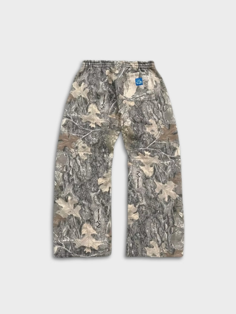 Calça de moletom Deus x Decarba