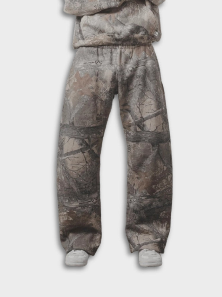 Calça de moletom Deus x Decarba