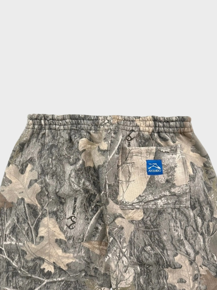 Calça de moletom Deus x Decarba